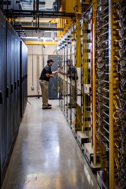 Patch panel termination in a Brisbane distribution frame — terminated and tested by UNS