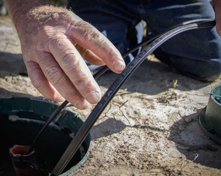 Communications pit and underground fibre lead-in cable installed in Brisbane